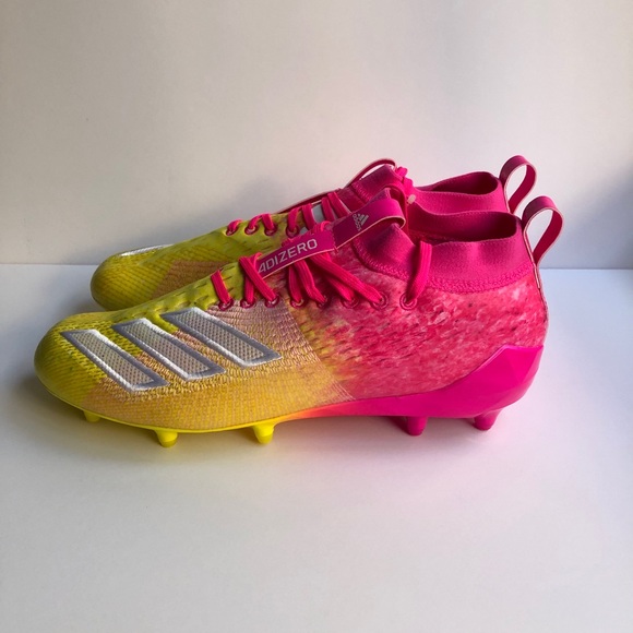 pink and yellow football cleats